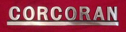 nameplate that is half (CORC) Satin aluminum and half (ORAN) Polished Aluminum
